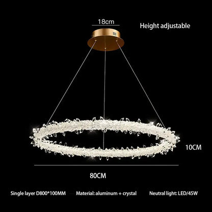 A modern crystal flower led ring chandelier with gold ceiling mount and clear crystals for dining room decorbites lighting