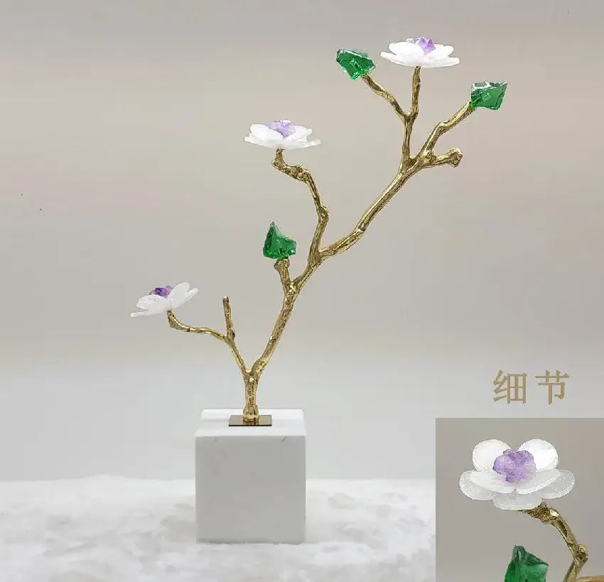 Delicate gold-toned crystal flower tree sculpture with white blossoms purple centers and green gemstone leaves on marble base decorbites decor
