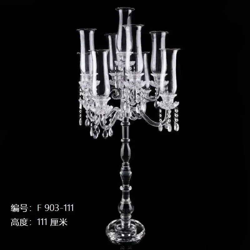 Clear crystal glass candle holders with multiple slender arms and teardrop accents for elegant dining room decorbites decor