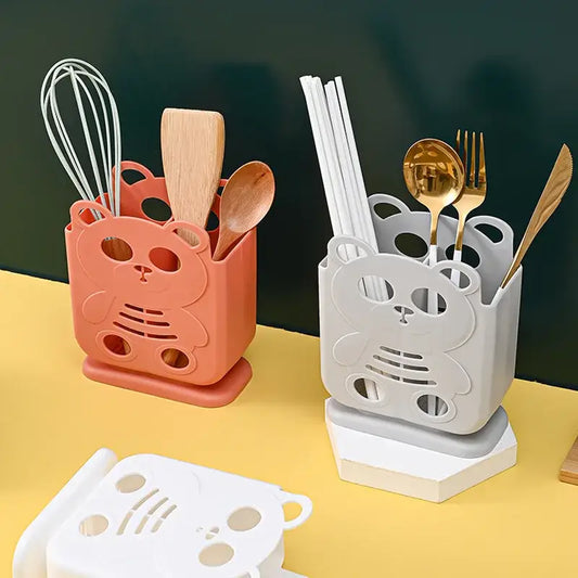 Cute coral and white plastic bear-shaped kitchen storage cutlery organizer stand with cut-out facial features decorbites cutlery organizer