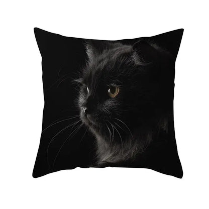 Black cat pillowcase featuring a high contrast photographic print of a fluffy black cat with golden eyes by decorbites