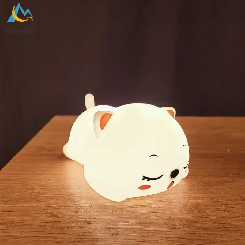 Cute cream cat silicone led night light with white body orange inner ears and rosy cheeks for bedroom decorbites decor