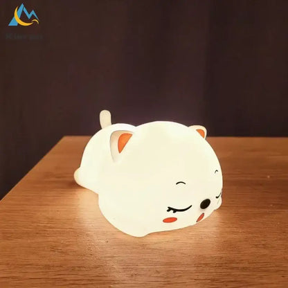Cute cream cat silicone led night light with orange ears and rosy cheeks for bedroom decorbites cat silicone night light