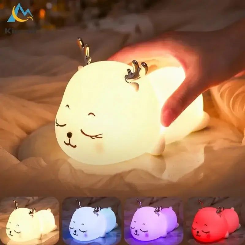 Cute cream colorful deer led lamp featuring a white sleeping reindeer design glowing in warm hues for bedroom decorbites colorful deer decor