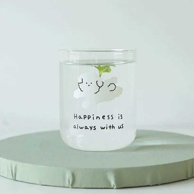 Clear glass cup with frosted lower half featuring a white cartoon cloud and happiness phrase dog glass cup for kitchen use