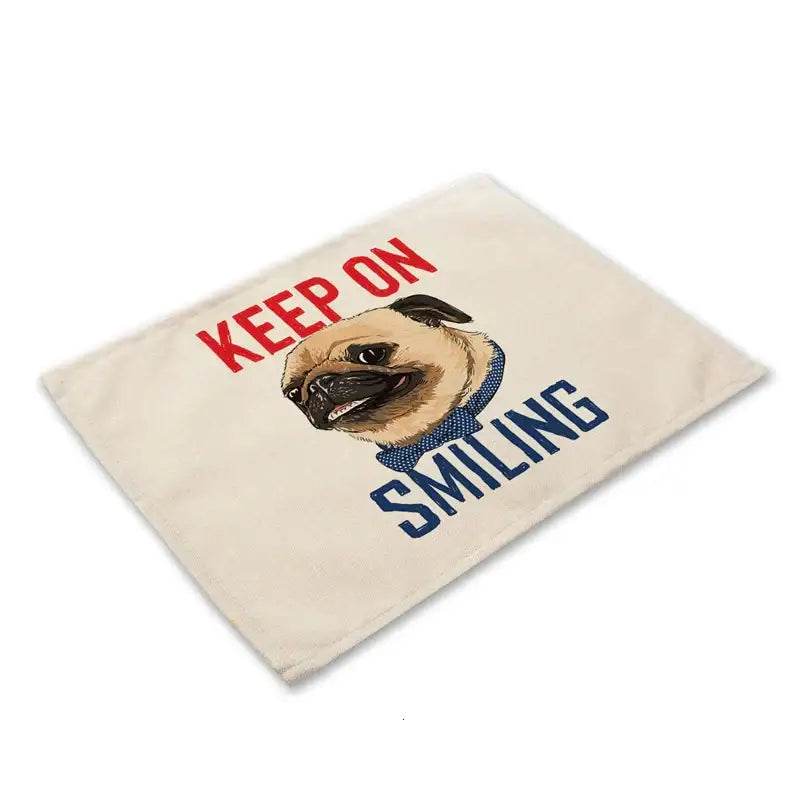 Beige canvas cute dog linen placemat with a pug illustration and keep on smiling text for dog linen dining decorbites