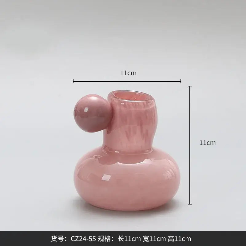 Glossy pink ceramic candle holder with rounded base and spherical knob from decorbites cute glass ball collection for living room decor