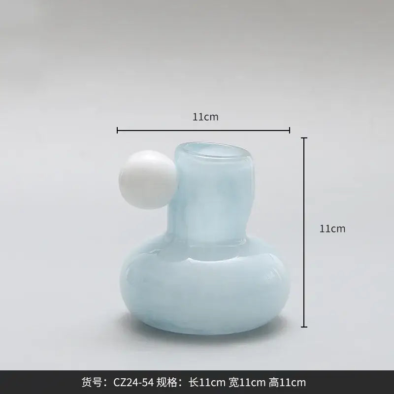 Cute glass ball light blue translucent glass vase with white spherical accent used as a decorbites cute glass candle holder