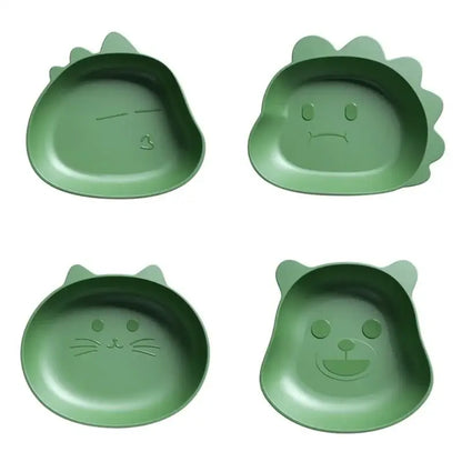 Set of four green plastic bear shape fruit plates with cute facial expressions and spiky ears for snacks