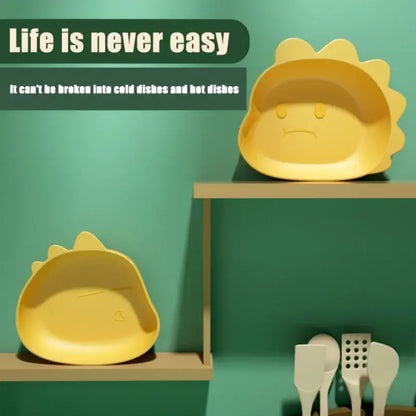 Yellow sun-shaped children’s fruit plate with smiling face and spiky rays from cute green bear shape fruit plate set of 4