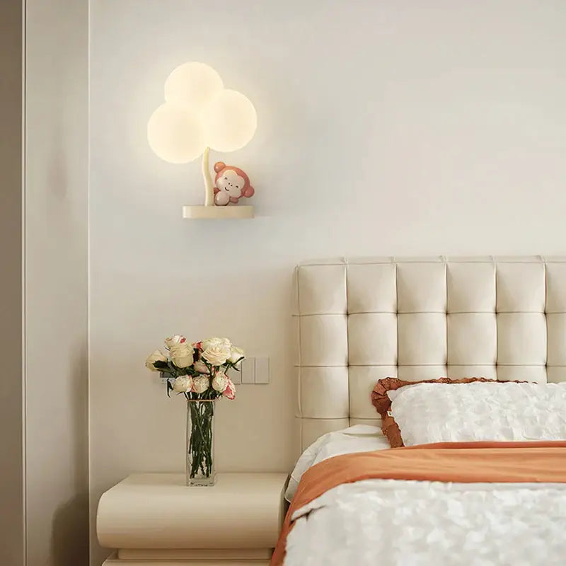 Cute monkey tree wall lamp with cloud shape light and plush monkey figurine by decorbites for bedroom decor