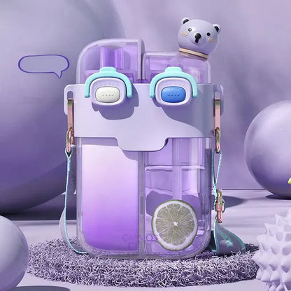 Purple gradient plastic double-bin sippy cup with light blue white accents and cute bear face design for kids