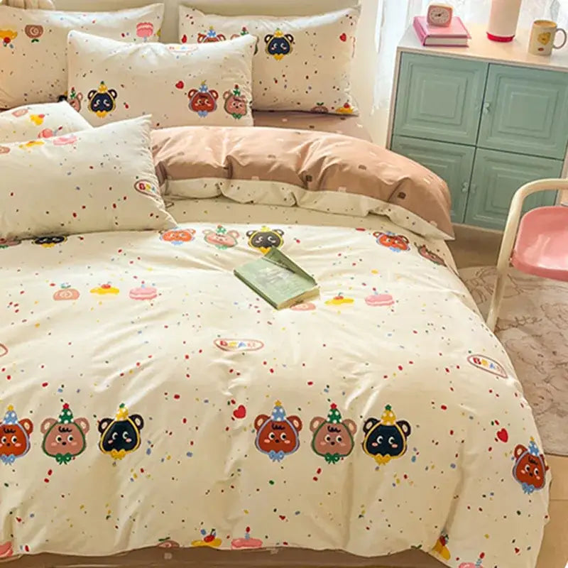 Cream-colored decorbites cotton floral bedding set with playful cartoon bears party hats and colorful confetti patterns