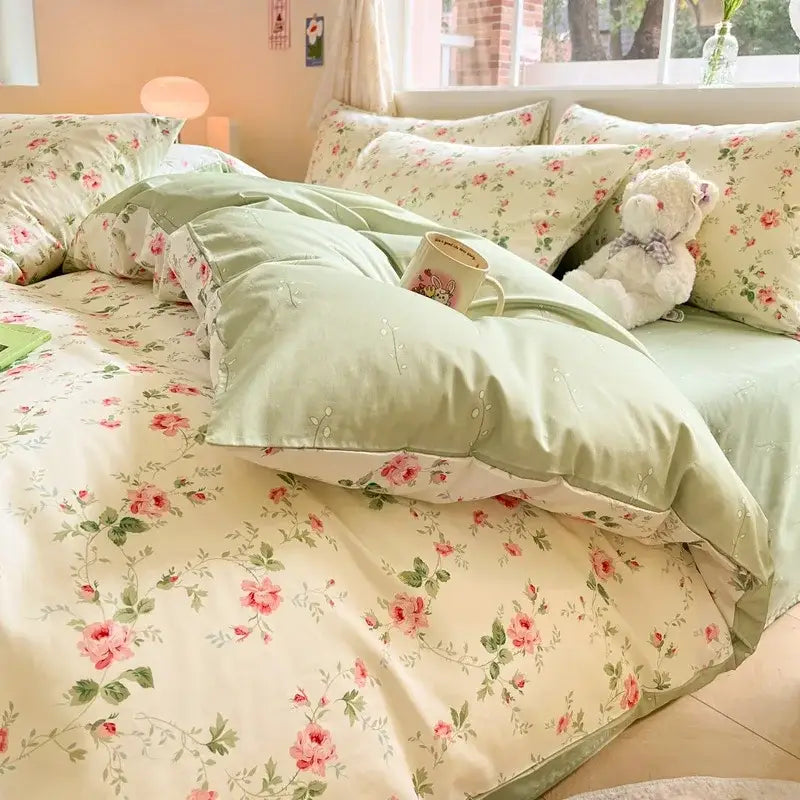 Pastel green and cream cotton bedding set with pink roses floral print from Decorbites cotton floral collection