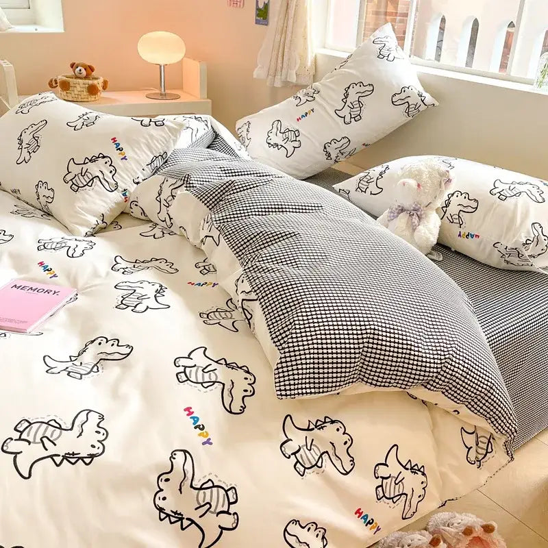White dinosaur-themed bedding set with black line drawings and colorful happy text in decorbites cotton floral print