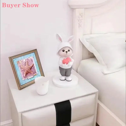 White bunny rabbit desk figurine wearing a hood and holding a red heart for cute home decor and bedroom display