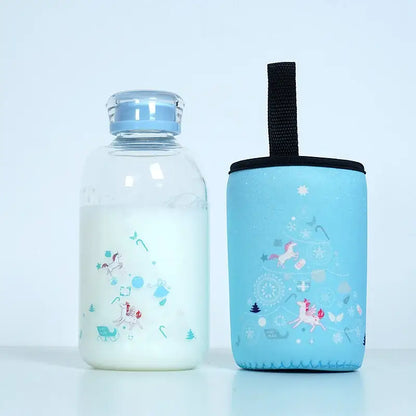 Clear decorbites blue glass water bottle with light blue lid whimsical unicorn decals and matching neoprene sleeve