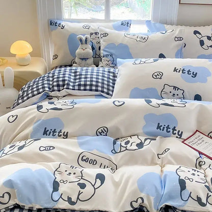 Cute printed cotton cream duvet cover with blue cartoon cat dog prints and navy gingham blanket for bedroom decorbites