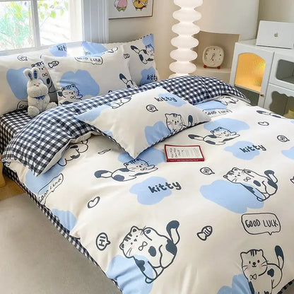 Cute printed cotton duvet cover with cream and navy colors featuring black-and-white cartoon cats and cloud patterns