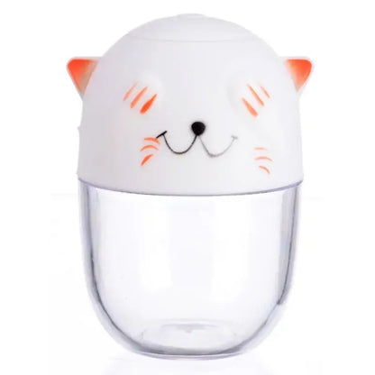 White cat-themed plastic decorbites cat spice jar with orange accents and clear base in ceramic spice jar set