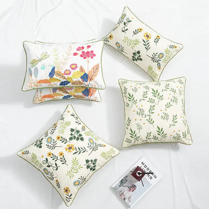 Set of four cream cushion covers with daisy floral embroidery and green piping for living room decorbites daisy floral decor