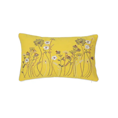 Bright yellow pillow cover with dandelion floral embroidery in white brown and beige for living room decor
