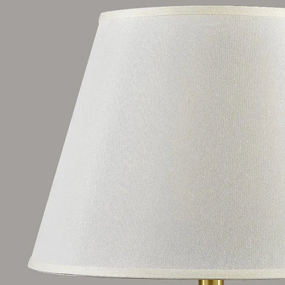 Dark blue ceramic table lamp with remote control featuring a white textured fabric lampshade for bedroom decorbites