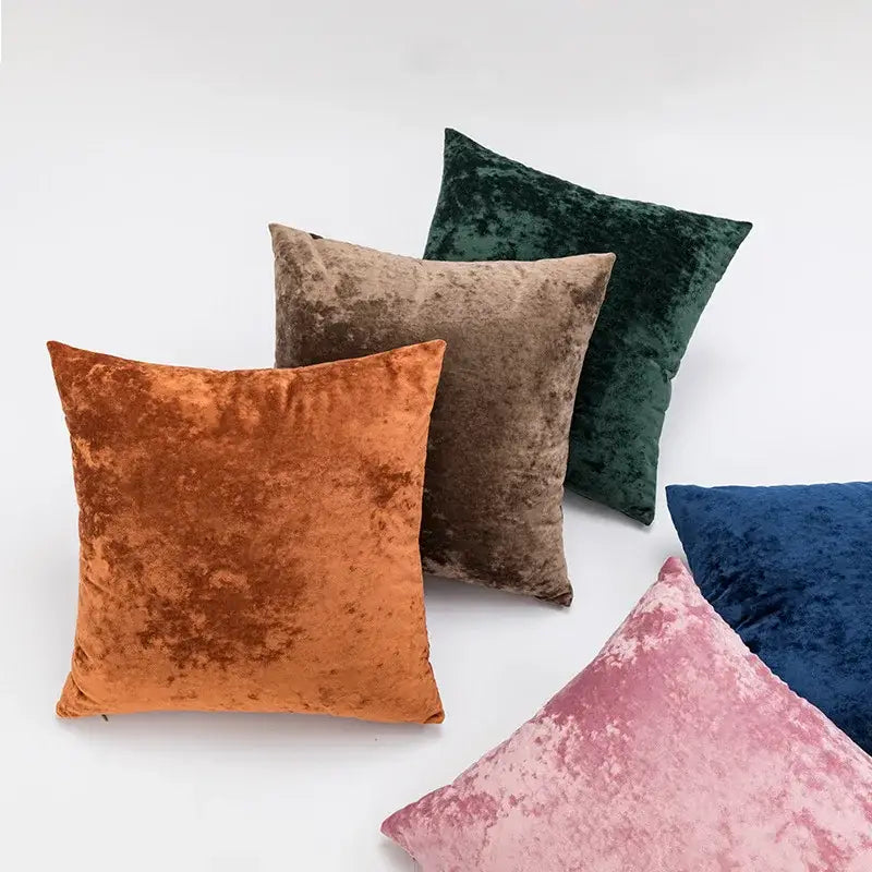 A collection of dark grain velvet pillow covers in earthy tones including rust orange taupe brown and deep green decorbites dark grain decor