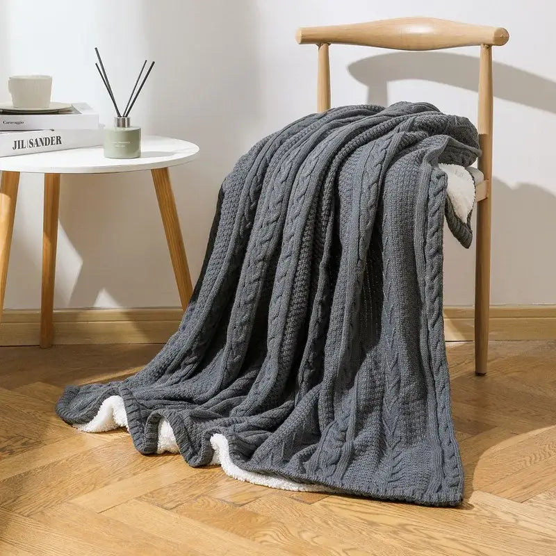 Dark gray fishbone knit blanket with cozy double layer and soft white fleece lining perfect for living room decorbites cozy double