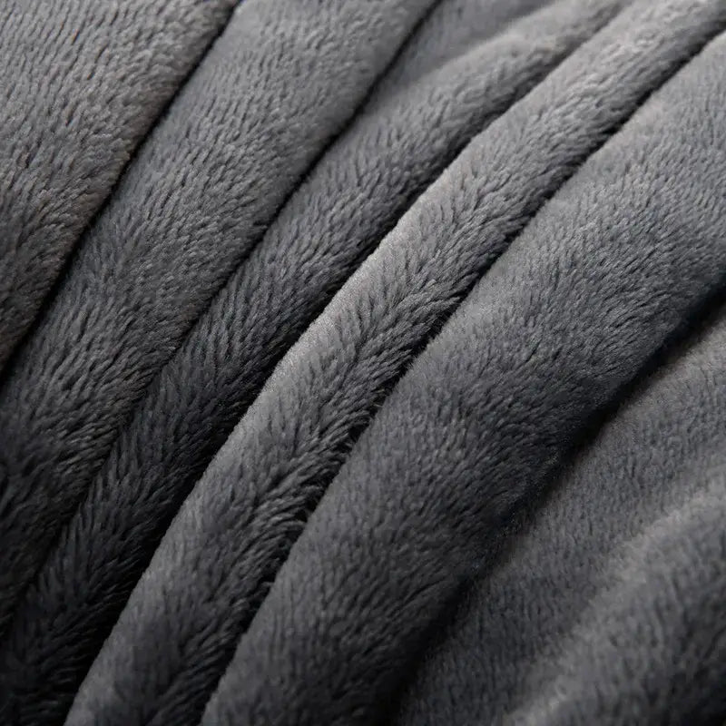 Dark gray plush fleece fabric with soft ribbed folds in decorbites cozy flannel blanket for living room sofa cover