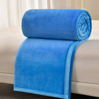 A plush vibrant blue cozy flannel blanket with soft velvety texture and neatly finished edges for living room decorbites cozy flannel