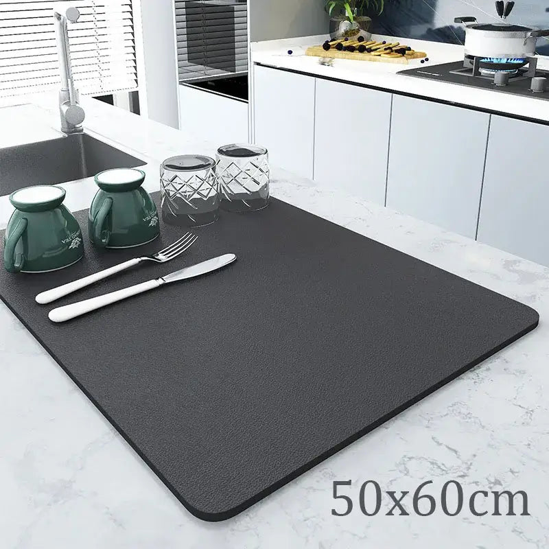 Dark gray textured silicone decorbites coffee mat designed as an absorbent kitchen drying mat for coffee use