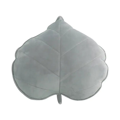 A soft light gray plush decorbites 3d leaf throw pillow with stitched veins and small stem for bedroom decor