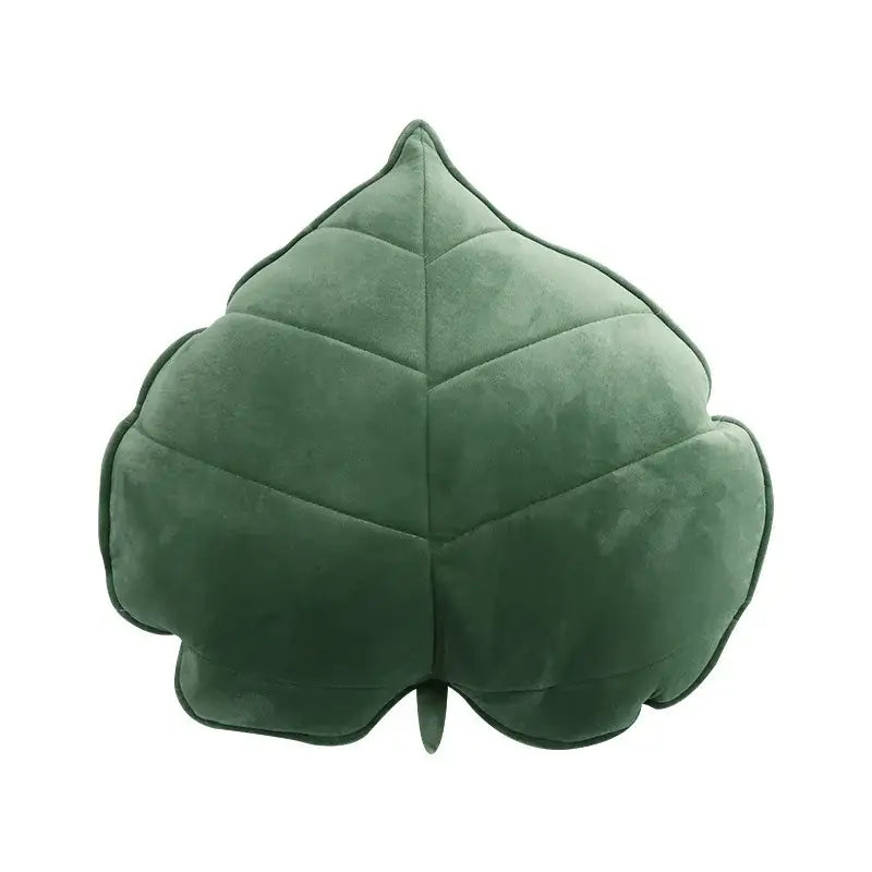 A dark green 3d leaf throw pillow with soft suede texture and stitched veins perfect for bedroom decorbites leaf throw