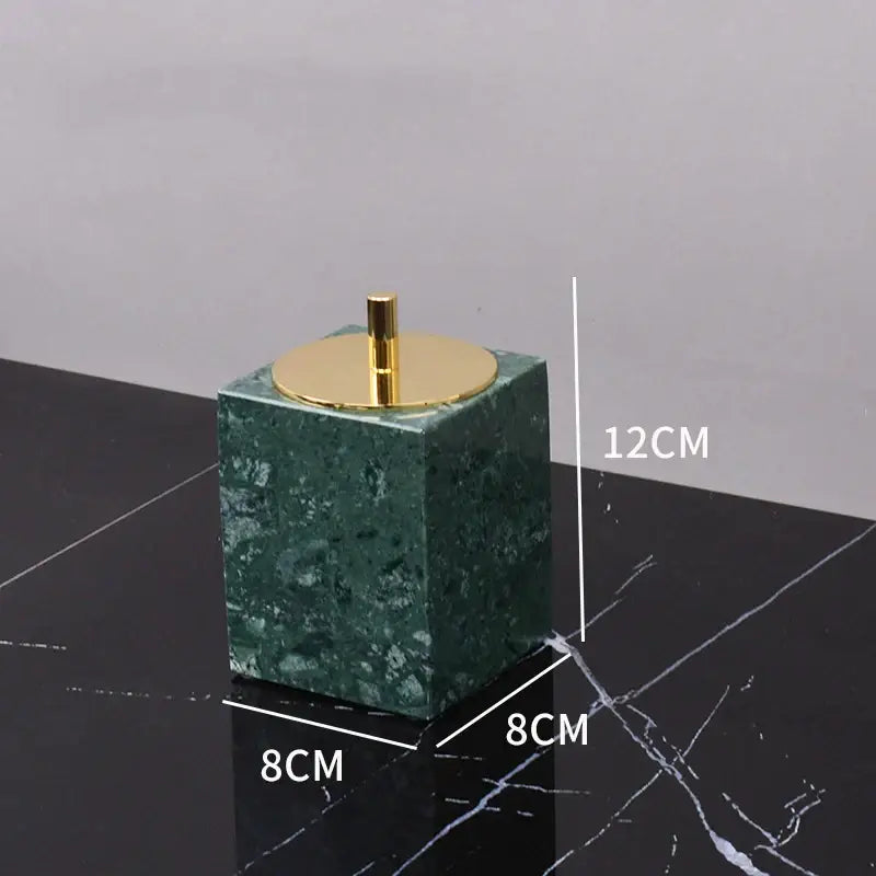 Dark green marble cube toothbrush holder with gold-toned lid and stem in decorbites dark green marble bathroom set