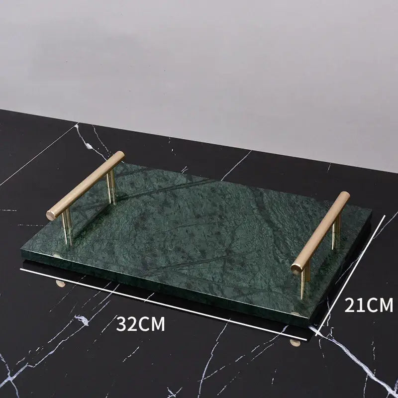 A sleek rectangular dark green marble serving tray with polished brass handles from decorbites green marble bathroom set