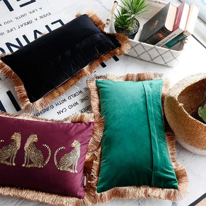 Three rectangular velvet cushion covers in black emerald green and burgundy with decorbites leopard cheetah print decor