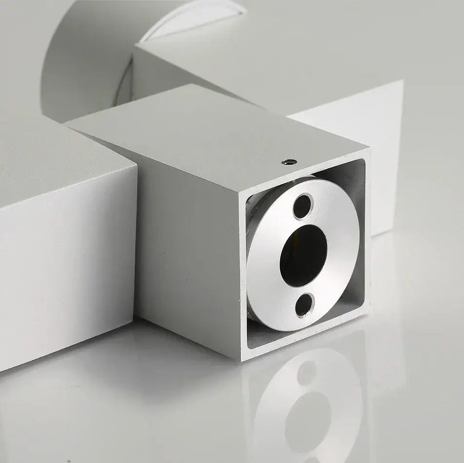 Silver aluminum laser diode module with circular lens and mounting holes for modern white downlight surface mount spotlight