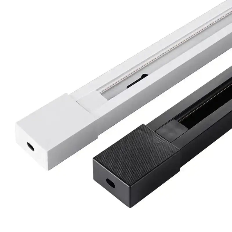 White and black aluminum track rail spotlight fitting with sleek modern rectangular profiles for kitchen lighting