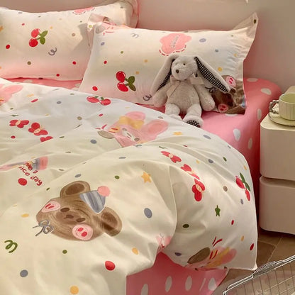 White duvet cover featuring pink cartoon bear and cherry prints with pastel polka dots in DecorBites summer bedding set