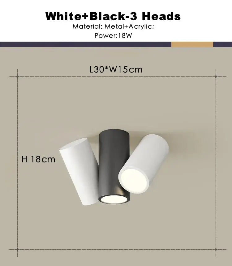 Modern white square dimmable ceiling spot light featuring three cylindrical metal and acrylic heads in black and white