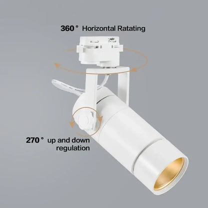 White cylindrical 25w dimmable led spotlight with gold interior and adjustable head for living room track lighting