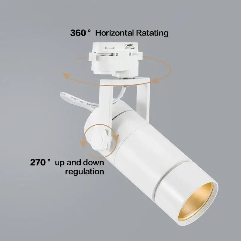 White cylindrical 25w dimmable led spotlight with gold interior and adjustable head for living room track lighting