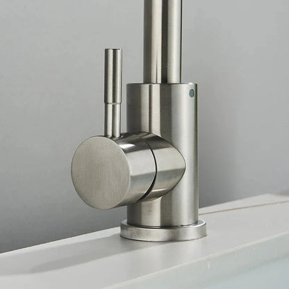Modern brushed stainless steel rotating sink faucet by DecorBites™ with sleek cylindrical design and single lever handle