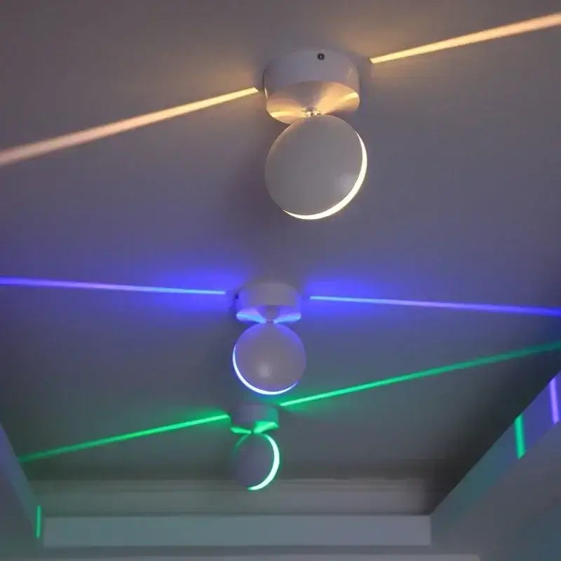 Modern white spherical window wall lamps with metallic base emitting vibrant laser beams for hallway lighting