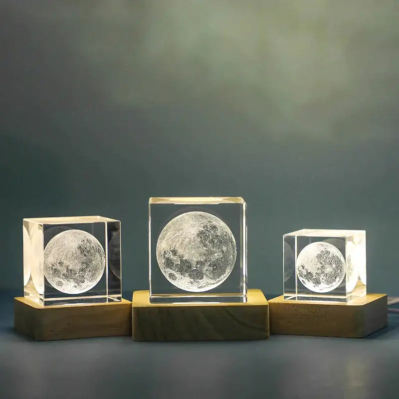 Three illuminated crystal moon sculptures in glass cube night light with wooden base by decorbites 3d moon