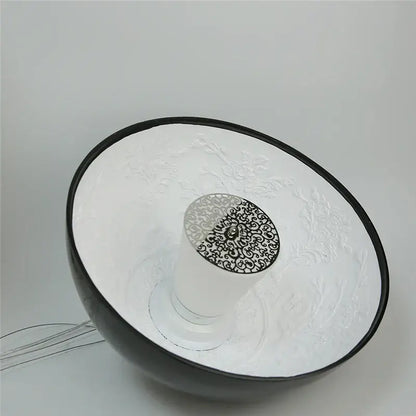 Black and white ceramic bowl with intricate filigree design complements modern black sky garden resin chandelier decorbites 3d sky