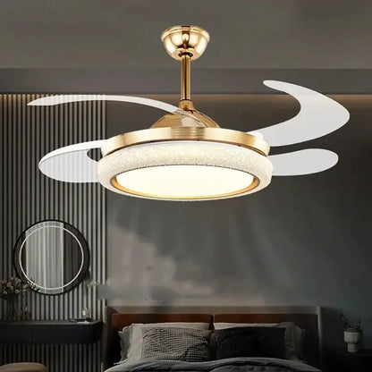 Gold-toned ceiling fan light with integrated LED and sleek curved white blades for modern bedroom use