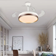 Modern black and white ceiling fan with remote control featuring white and bronze finish and integrated circular LED light