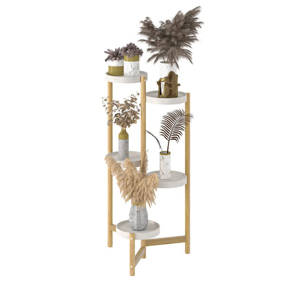 Modern four-tier plant stand with gold metal legs and white marble-effect shelves featuring decorative dried plants for indoor use